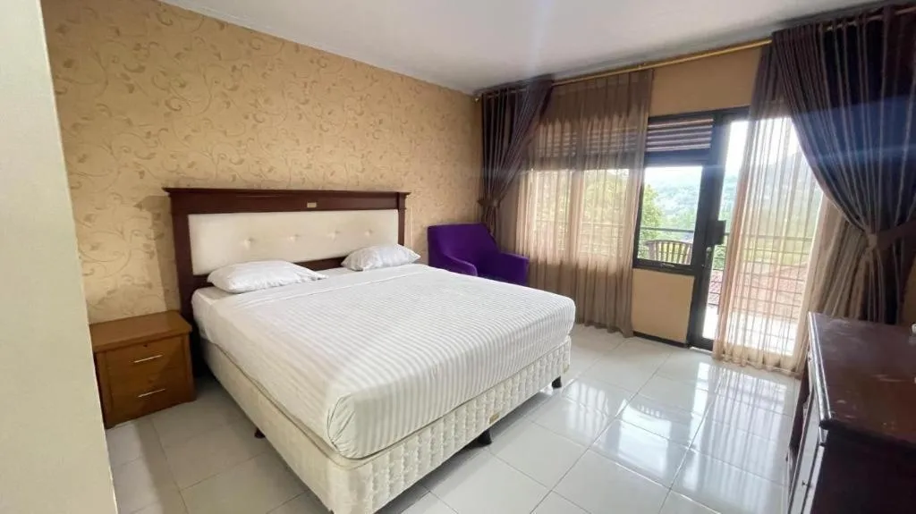 Bed in Rizen Premiere Hotel