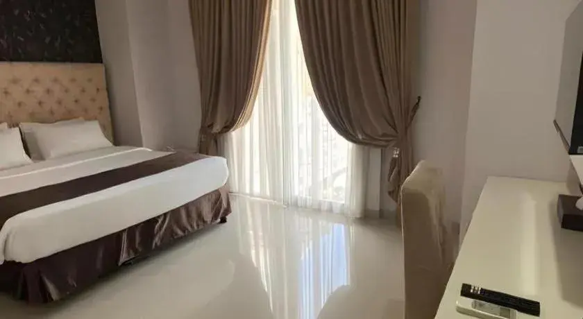 Bed in Rizen Premiere Hotel Bed in Rizen Premiere Hotel