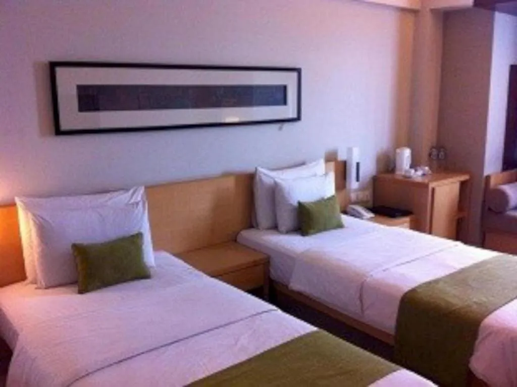 Bed in Mitra Bandung Hotel