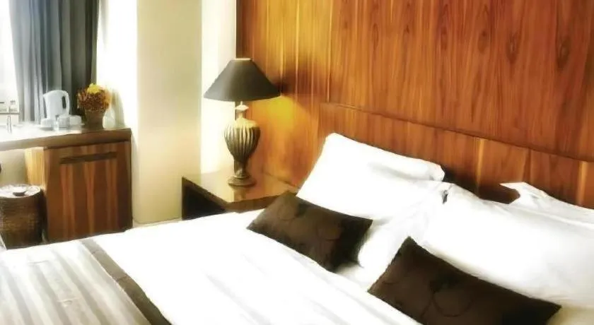 Bed in Mitra Bandung Hotel