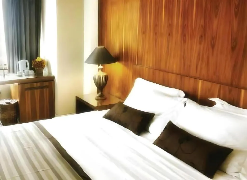 Bed in Mitra Bandung Hotel