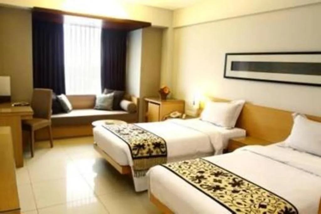 Bed in Mitra Bandung Hotel