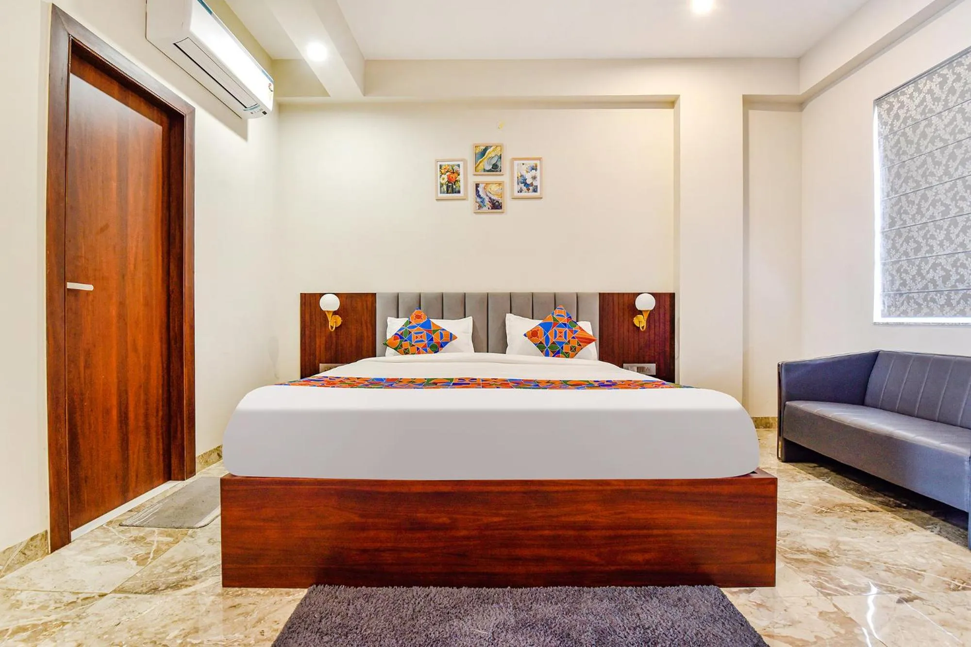 Bed in FabHotel Pravaasam Residency