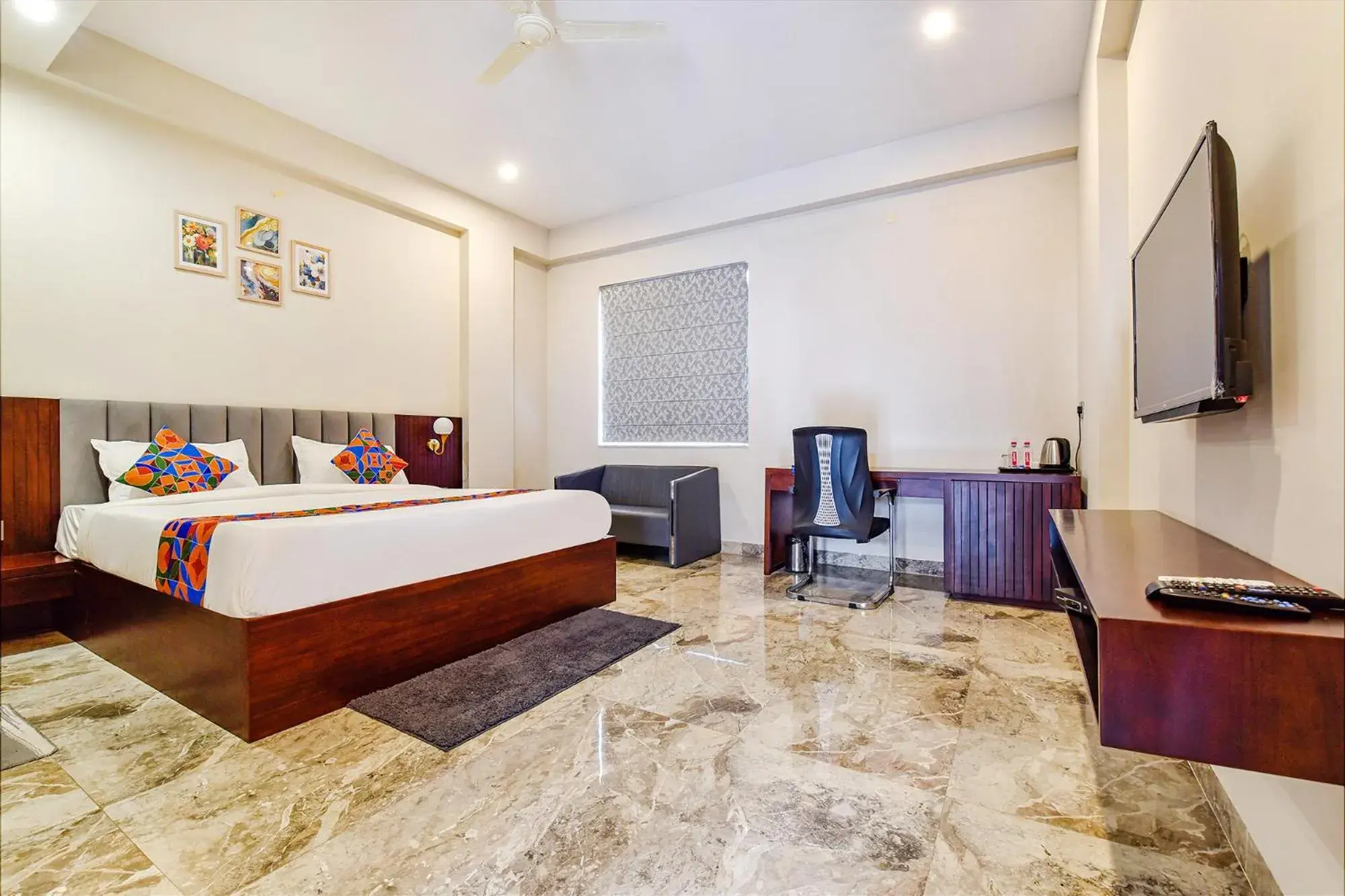 Bed in FabHotel Pravaasam Residency Bed in FabHotel Pravaasam Residency