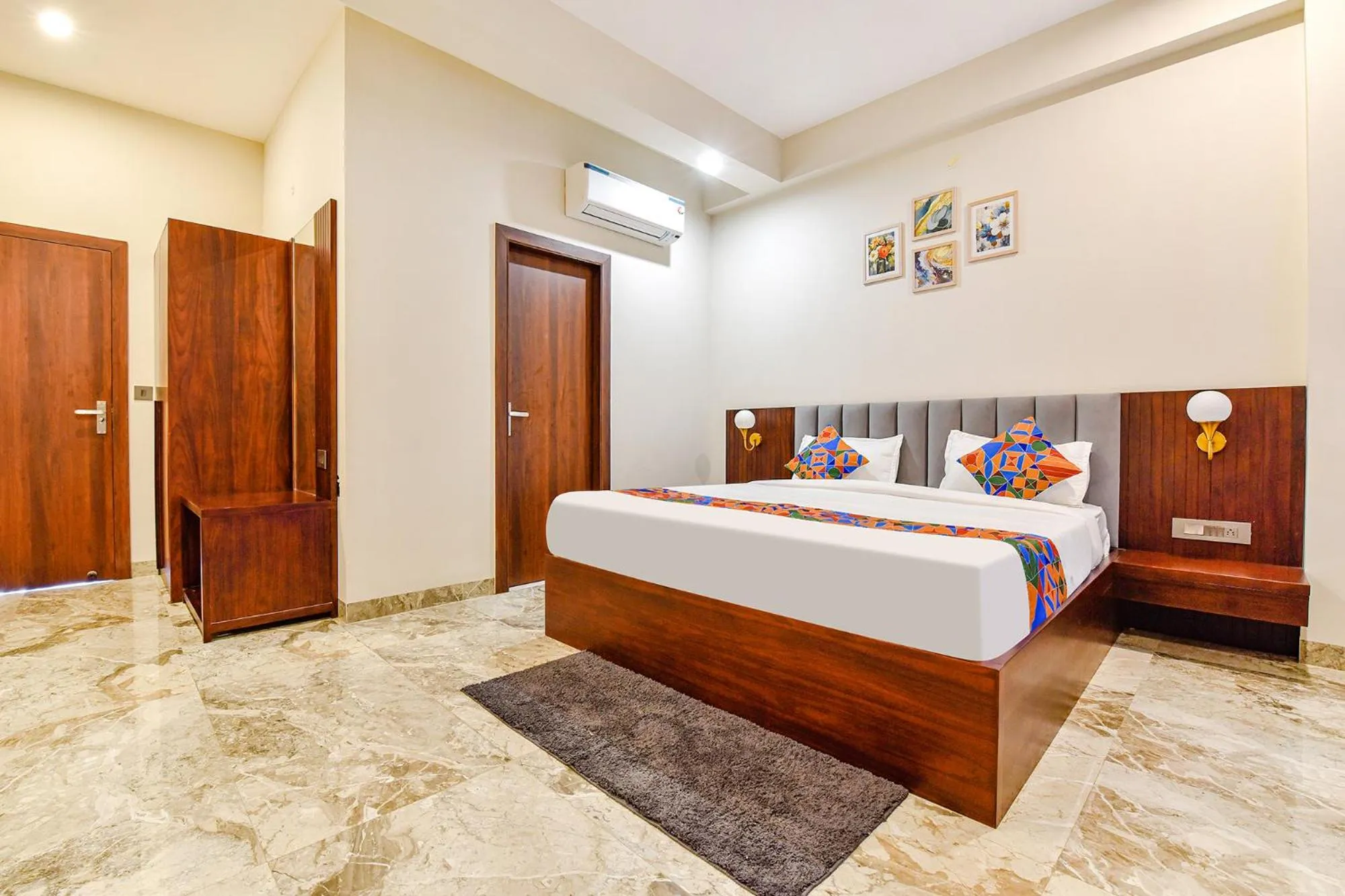 Bed in FabHotel Pravaasam Residency