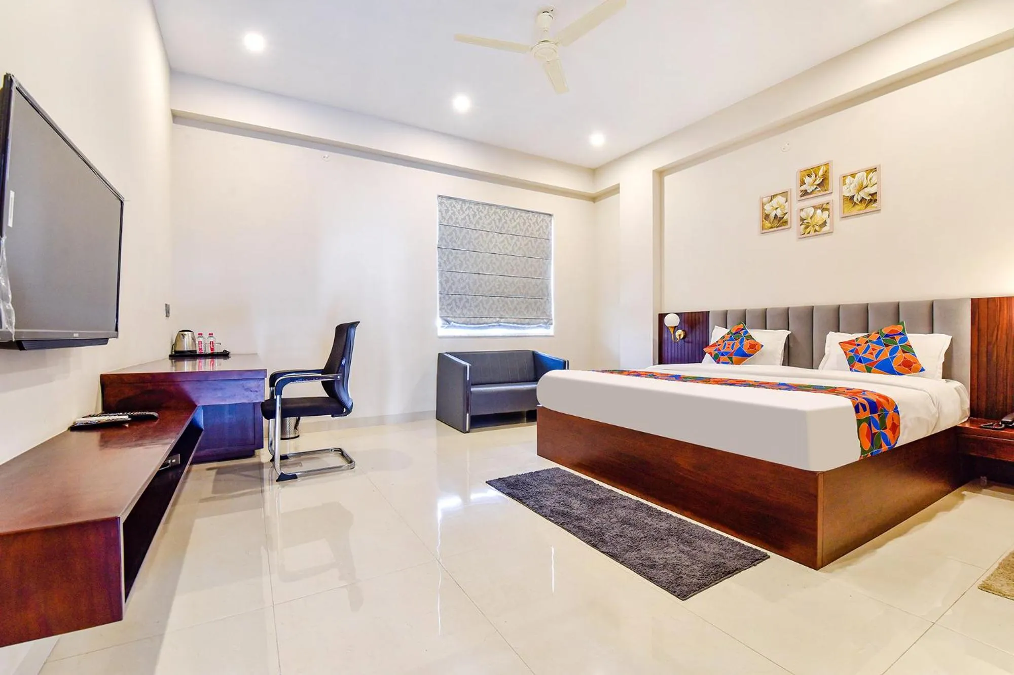 Bed in FabHotel Pravaasam Residency