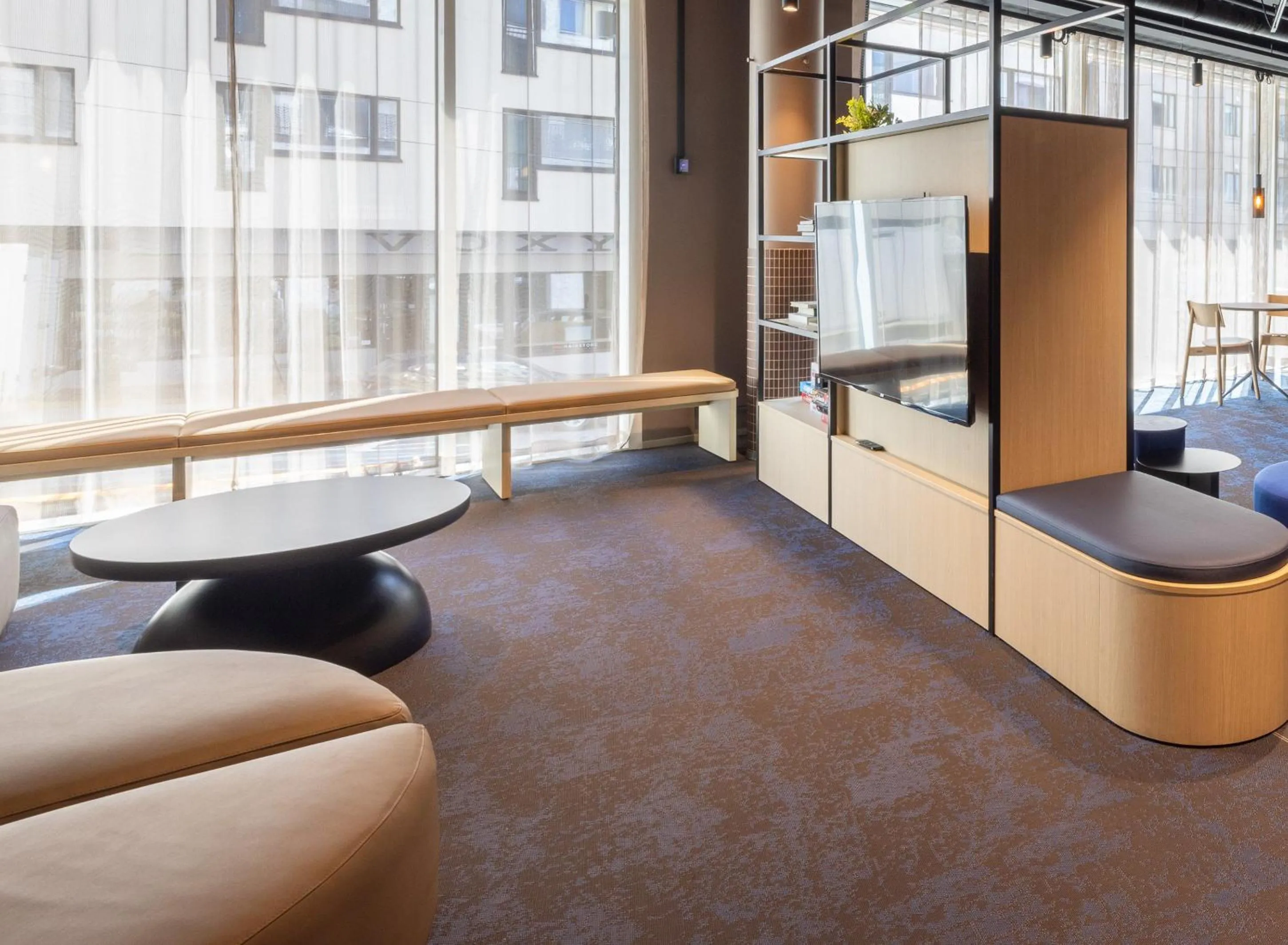 Communal lounge/ TV room in Citybox Helsinki