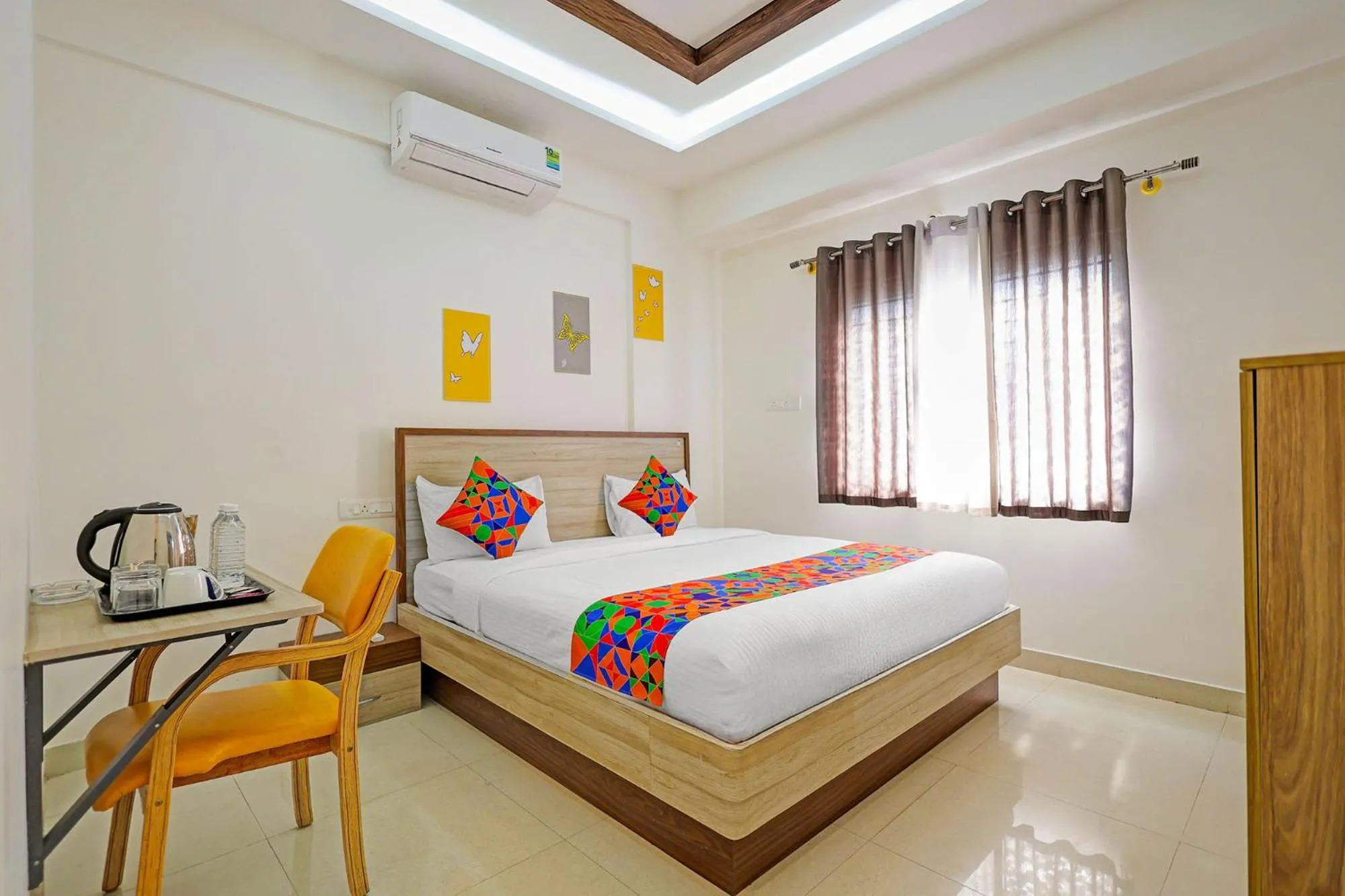 Bedroom in FabHotel Marella Grand Inn