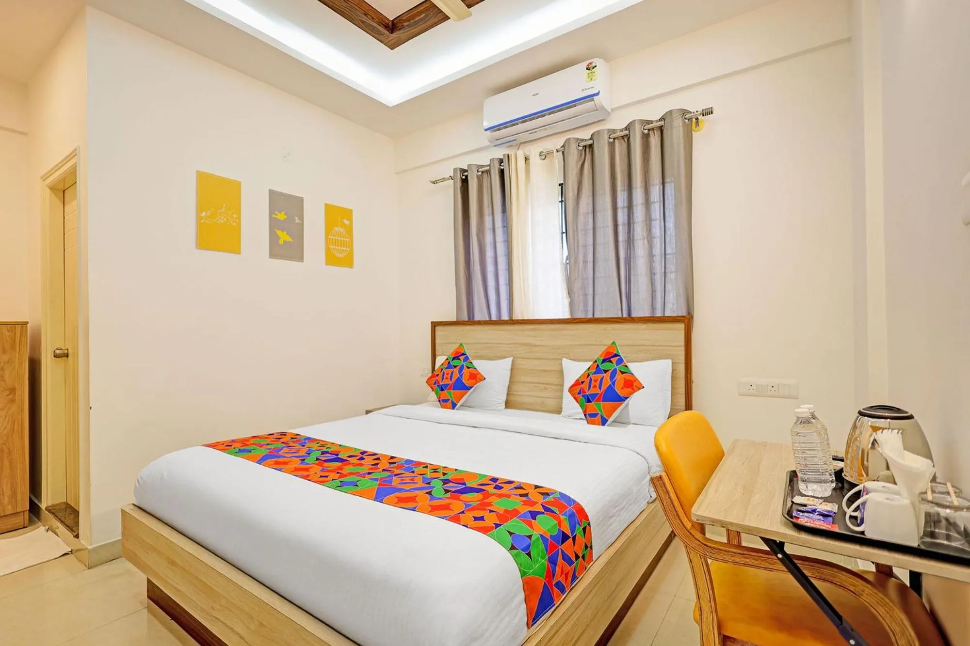 Bedroom in FabHotel Marella Grand Inn