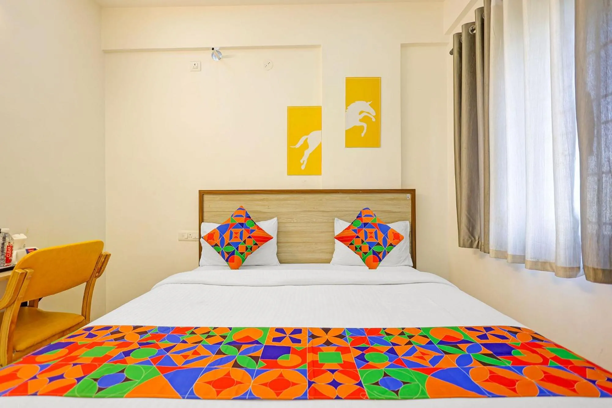 Bedroom in FabHotel Marella Grand Inn