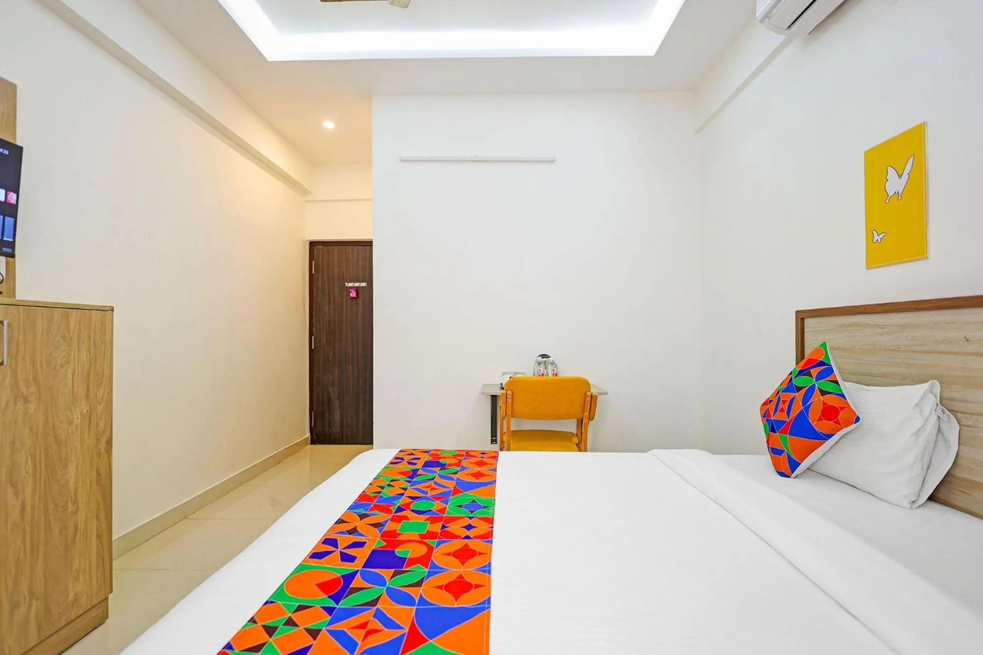 Bedroom in FabHotel Marella Grand Inn