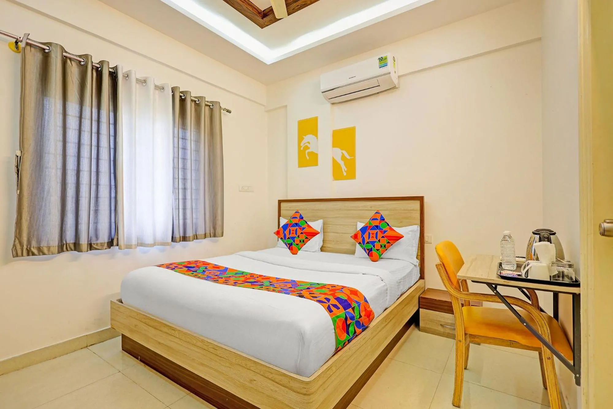 Bedroom in FabHotel Marella Grand Inn