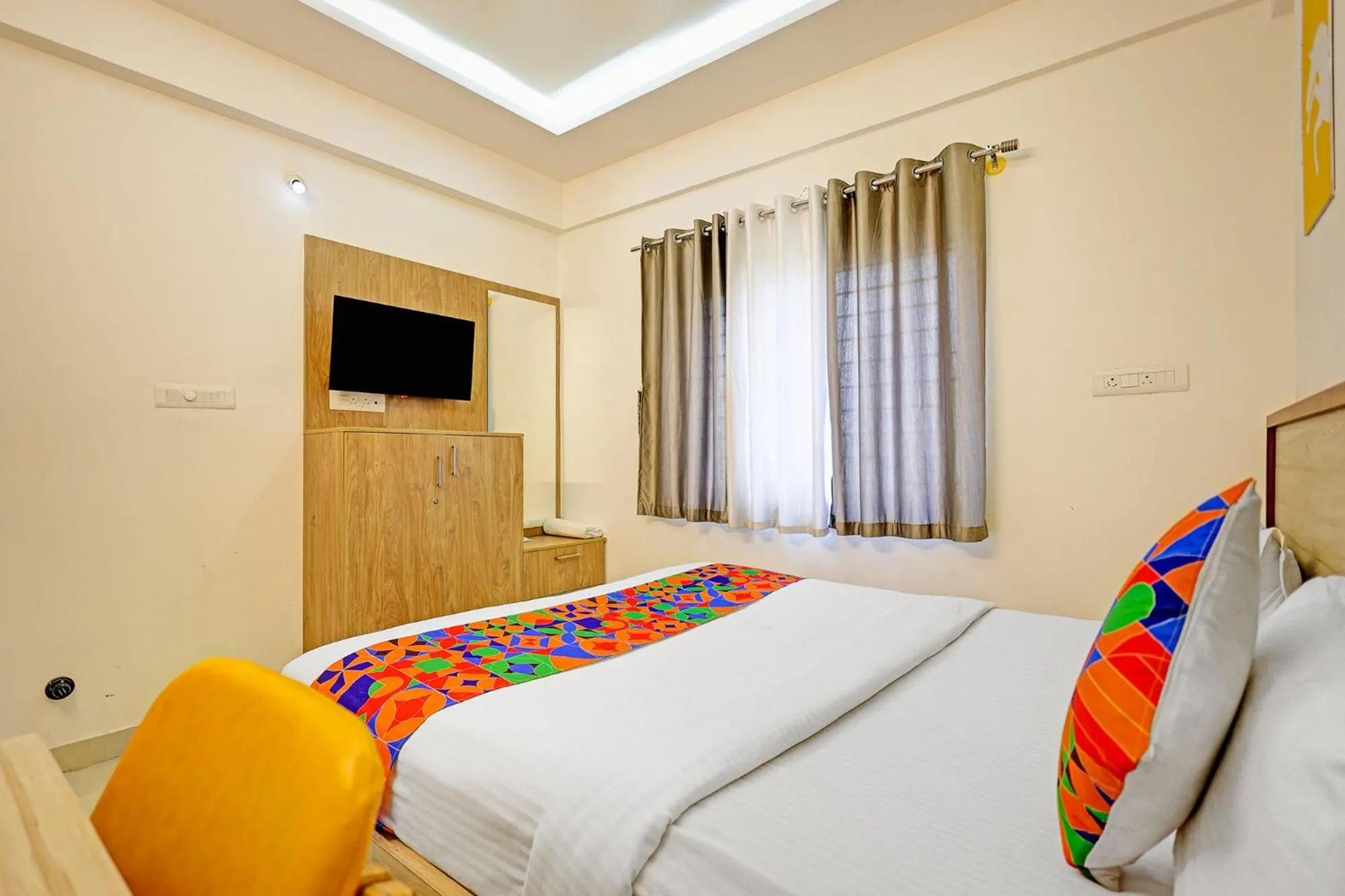 Bedroom in FabHotel Marella Grand Inn