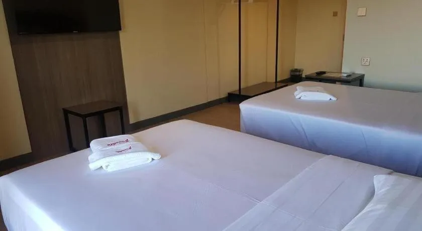 Bed in Travelite Hotel Legarda