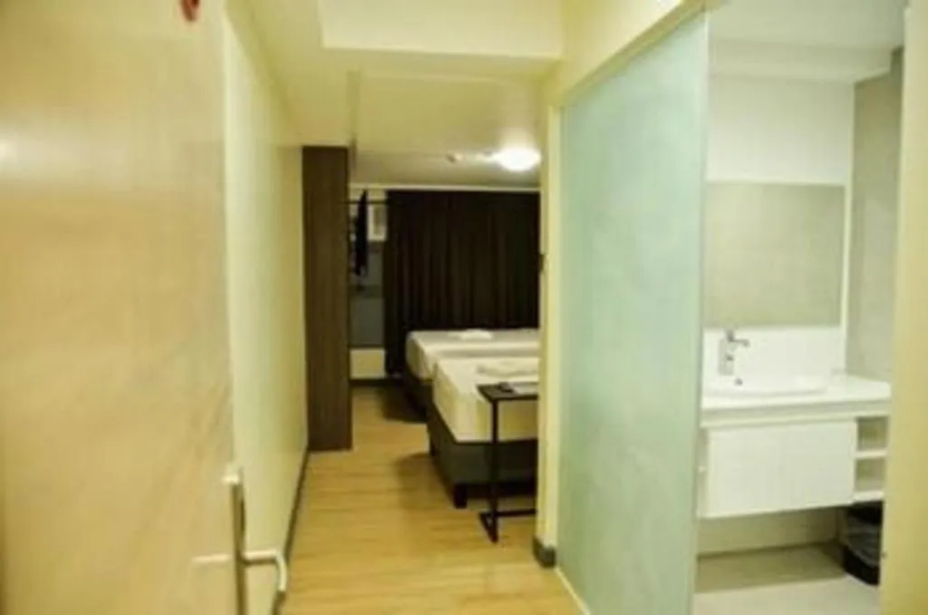 Bed in Travelite Hotel Legarda
