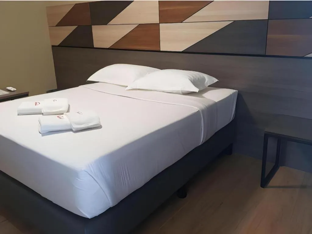 Bed in Travelite Hotel Legarda