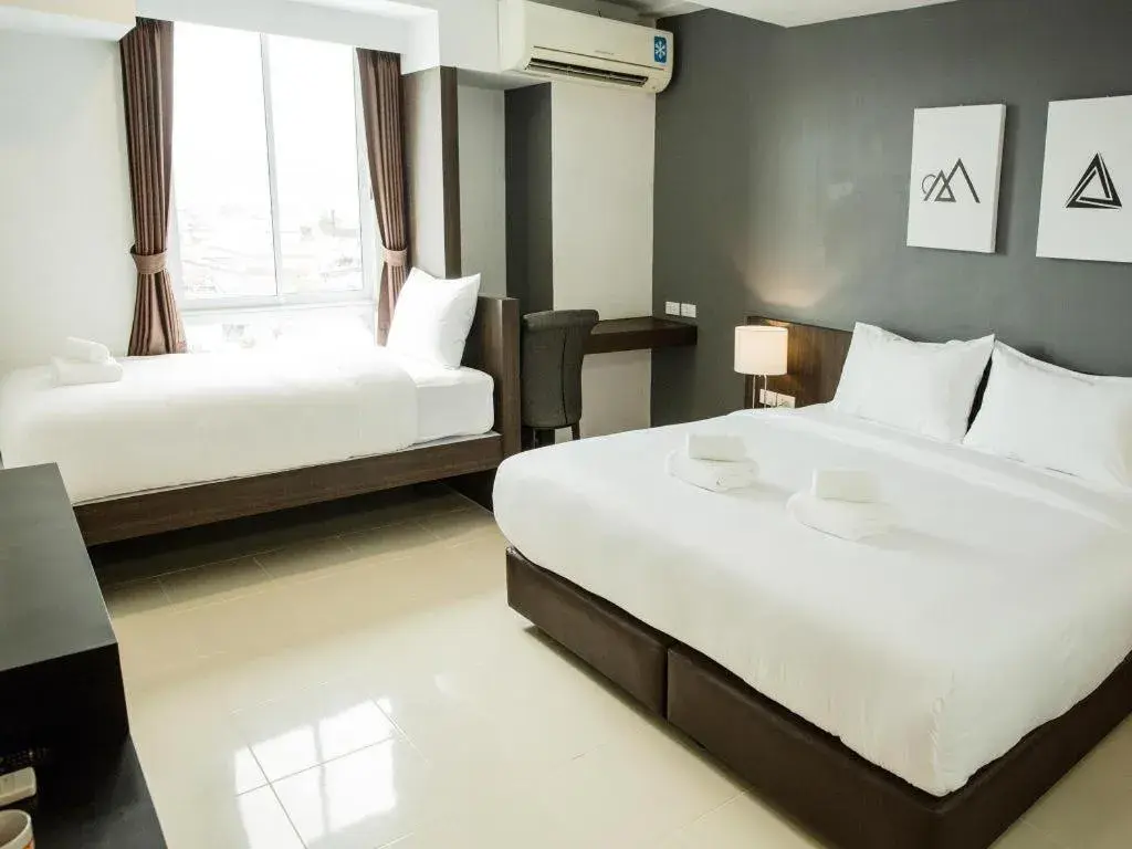 Bed in B2 Hat Yai Rat Uthit Boutique & Budget Hotel Bed in B2 Hat Yai Rat Uthit Boutique & Budget Hotel