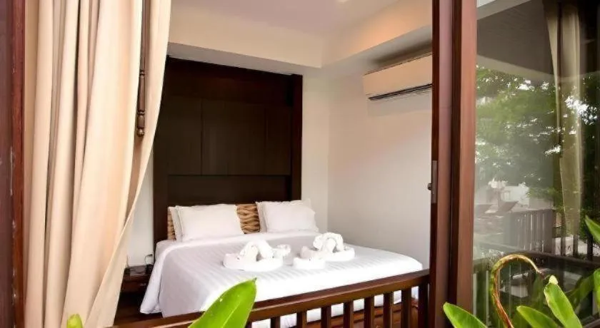 Bed in Maryoo Samui Hotel