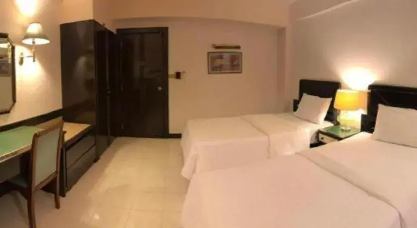 Bed in S.C. Heritage Hotel Bed in S.C. Heritage Hotel