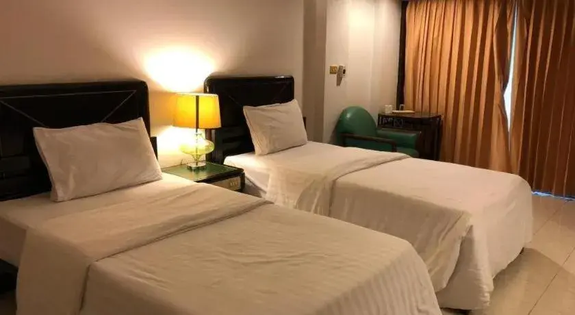 Bed in S.C. Heritage Hotel Bed in S.C. Heritage Hotel