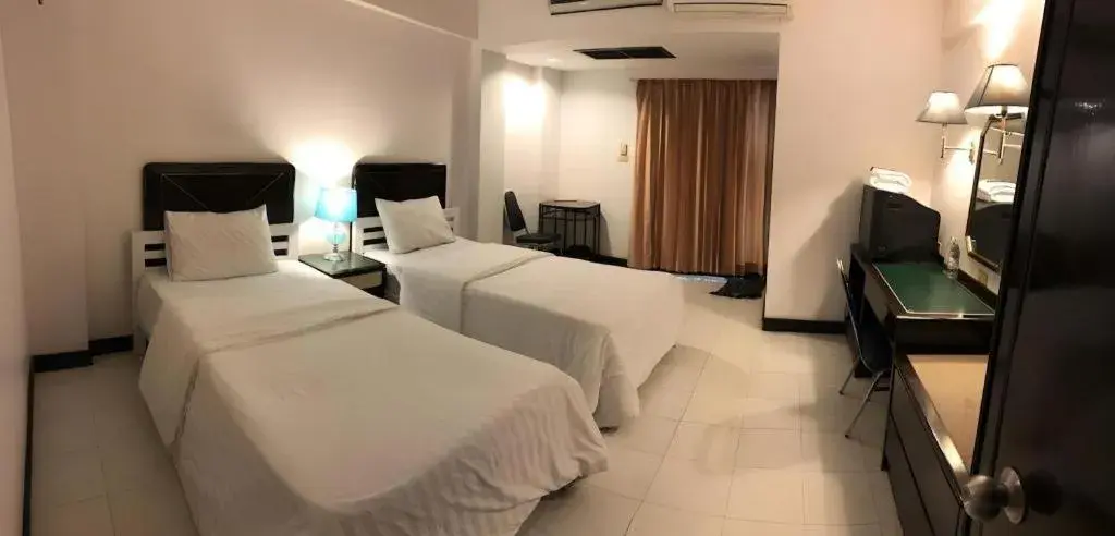 Bed in S.C. Heritage Hotel Bed in S.C. Heritage Hotel