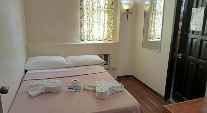 Bed in La Bella Casa Boracay Hotel