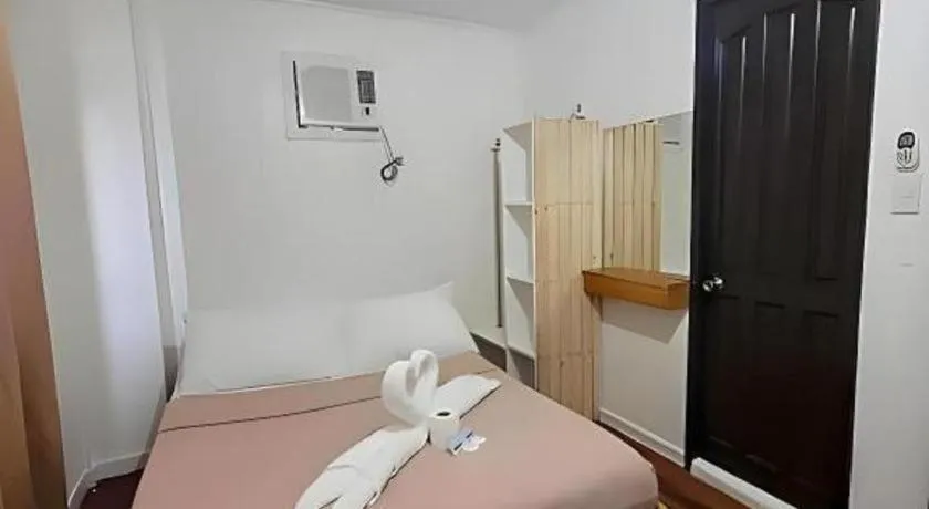 Bed in La Bella Casa Boracay Hotel