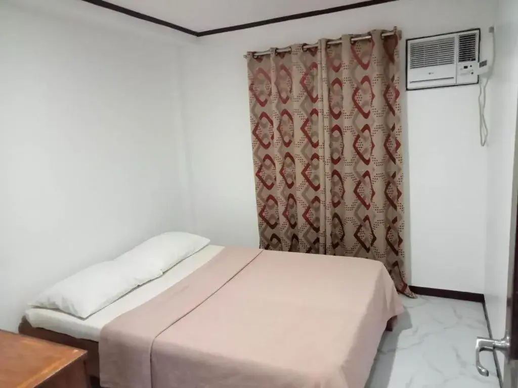 Bed in La Bella Casa Boracay Hotel Bed in La Bella Casa Boracay Hotel