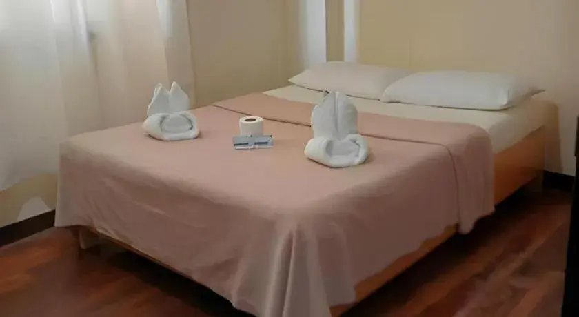 Bed in La Bella Casa Boracay Hotel Bed in La Bella Casa Boracay Hotel