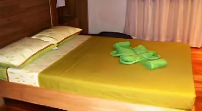 Bed in La Bella Casa Boracay Hotel