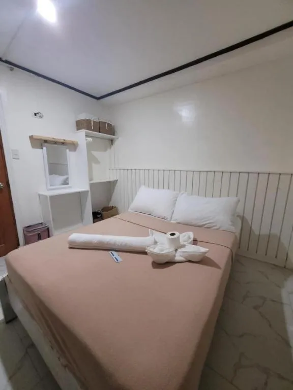 Bed in La Bella Casa Boracay Hotel