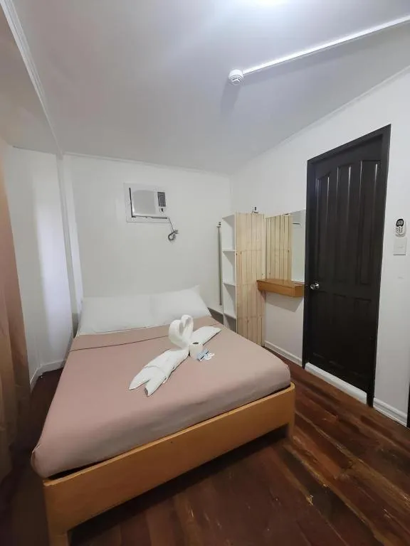 Bed in La Bella Casa Boracay Hotel