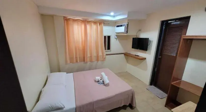 Bed in La Bella Casa Boracay Hotel Bed in La Bella Casa Boracay Hotel