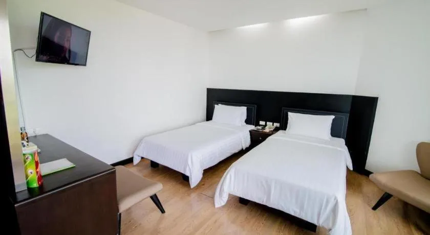 Bed in The Sez Hotel Bangsaen