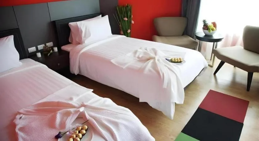 Bed in The Sez Hotel Bangsaen