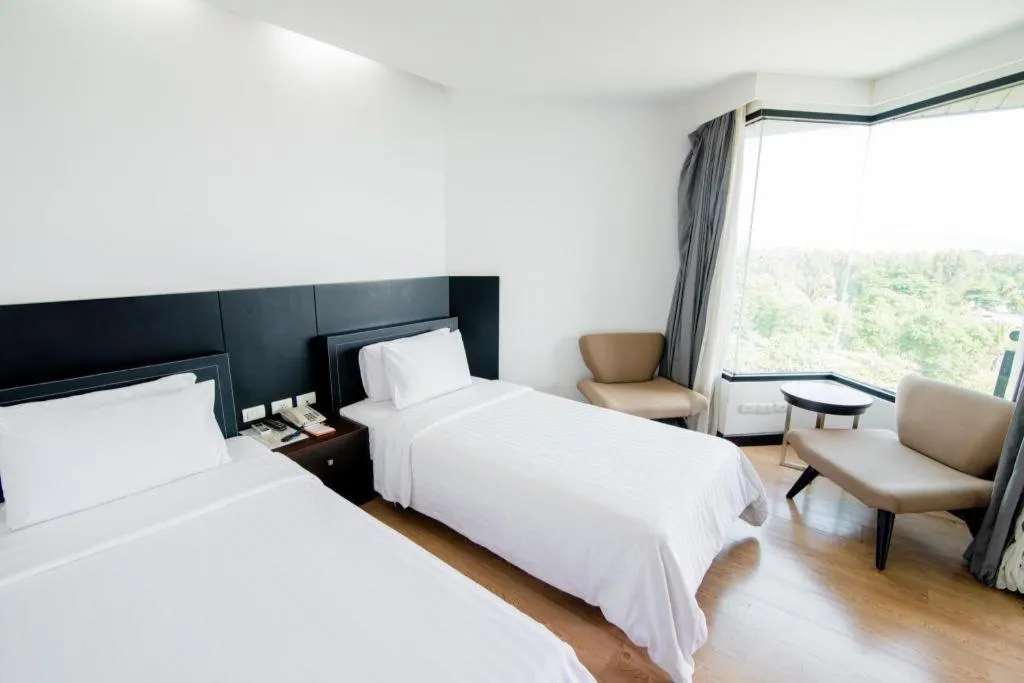 Bed in The Sez Hotel Bangsaen