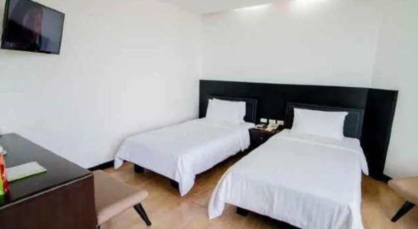 Bed in The Sez Hotel Bangsaen