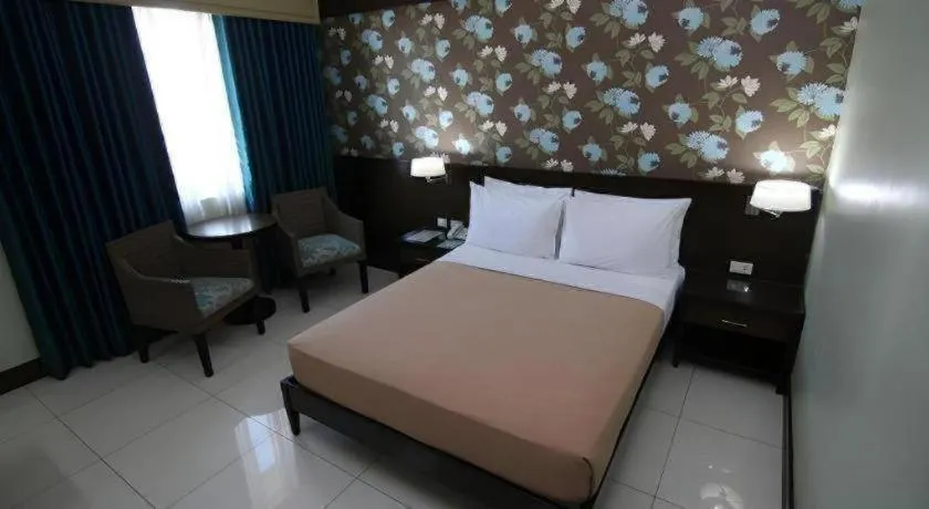 Bed in SMALLVILLE 21 HOTEL