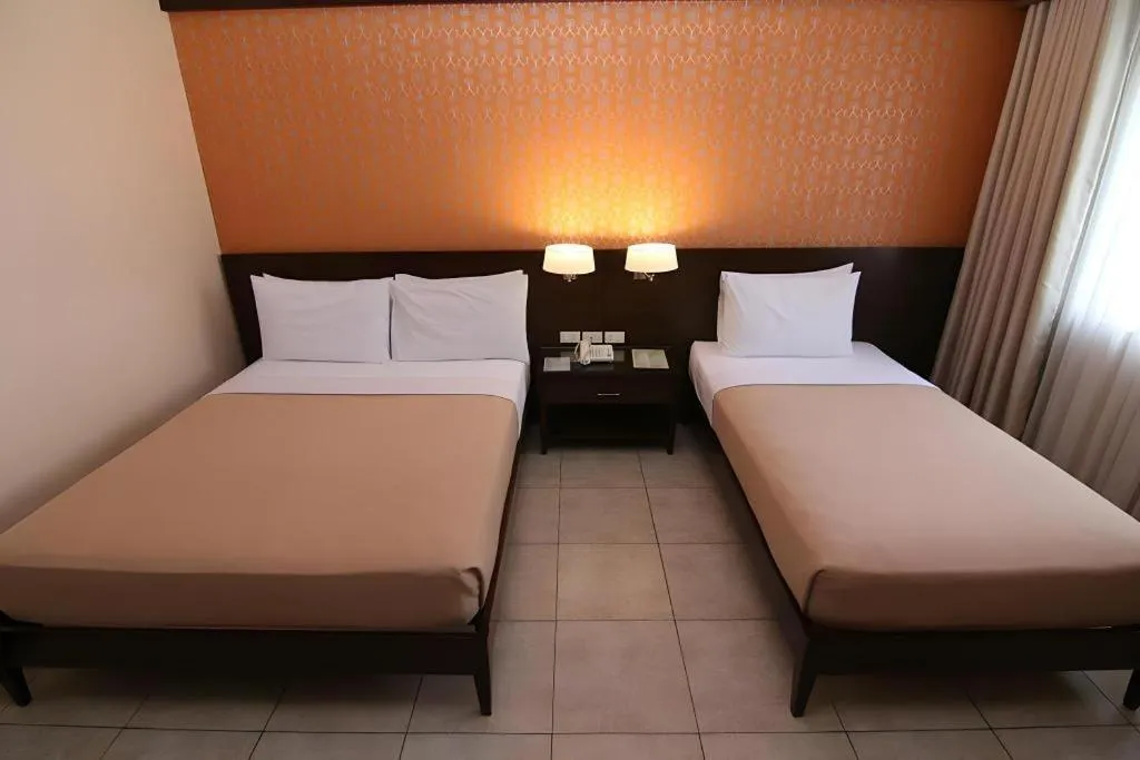 Bed in SMALLVILLE 21 HOTEL