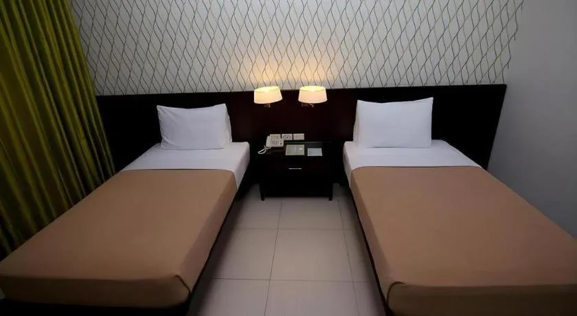 Bed in SMALLVILLE 21 HOTEL