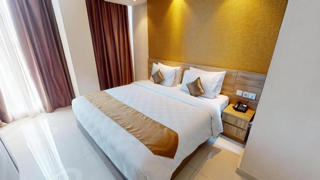 Bed in Wing Hotel Kualanamu Airport