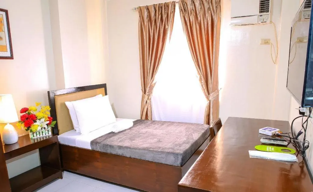 Bed in Leope Hotel Cagayan