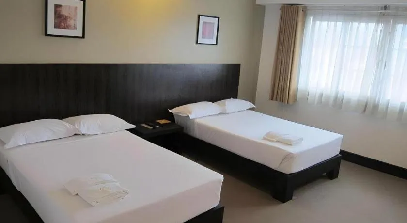 Bed in Citylight Hotel