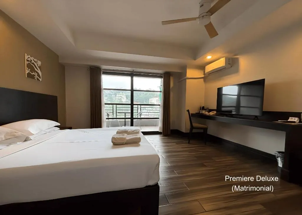 Bed in Citylight Hotel