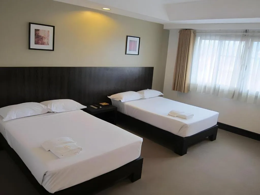 Bed in Citylight Hotel