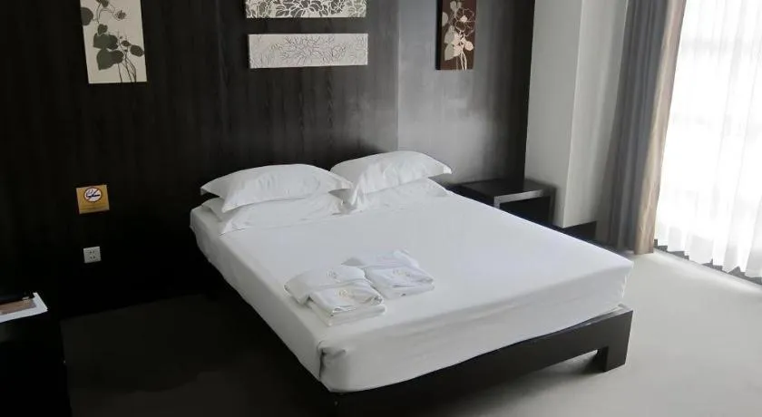 Bed in Citylight Hotel