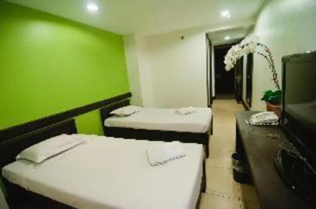 Bed in Citylight Hotel