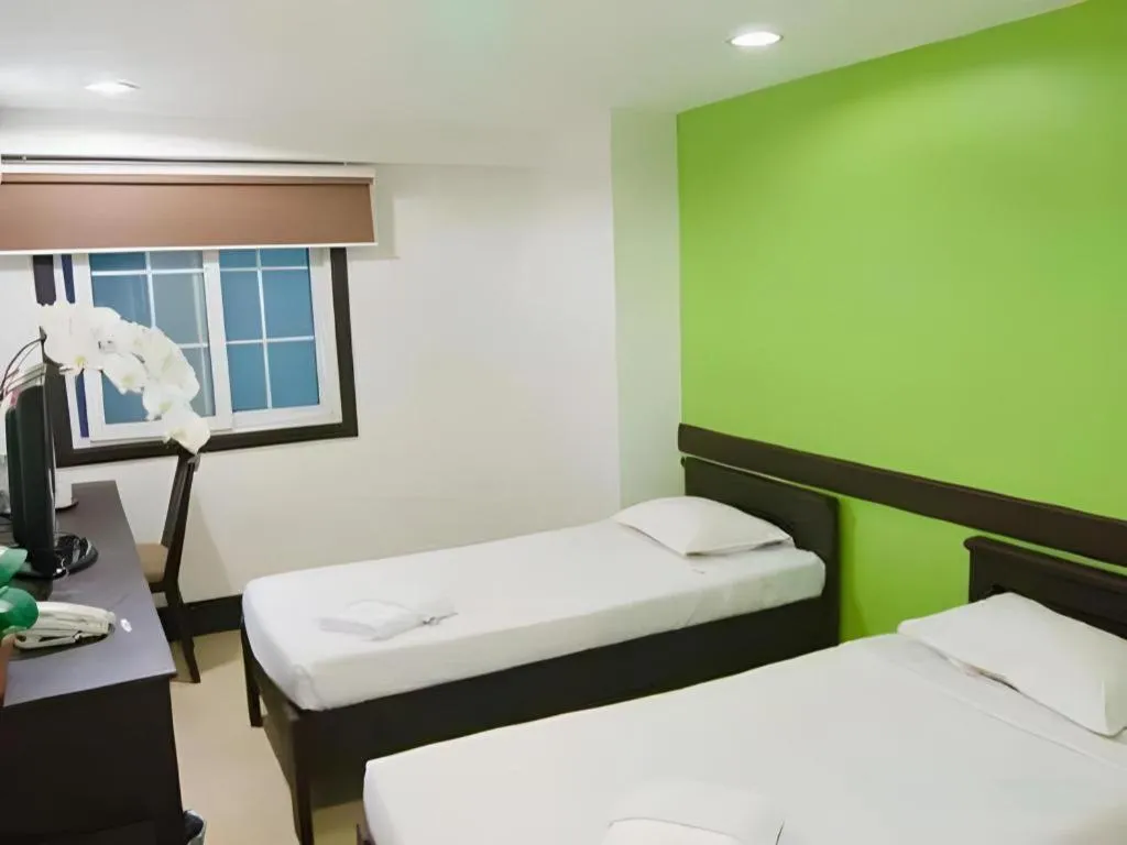 Bed in Citylight Hotel