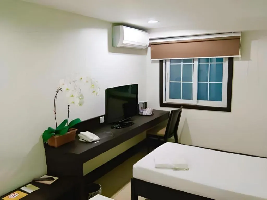 Bed in Citylight Hotel