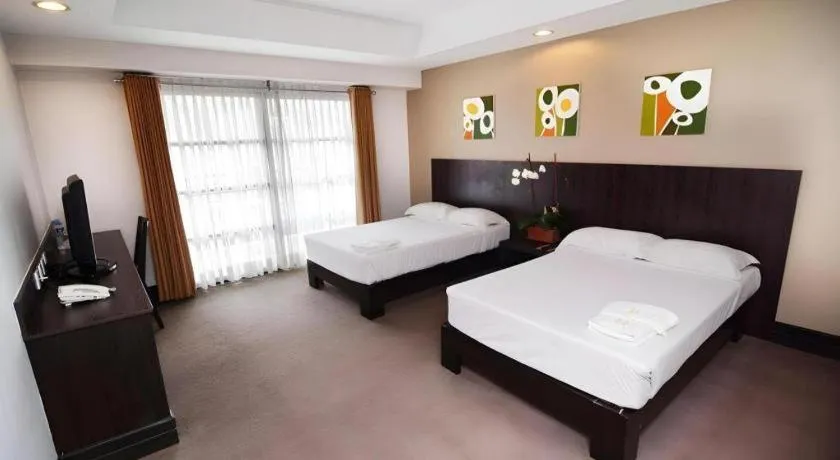 Bed in Citylight Hotel